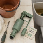 Régler flotteur chasse d eau : flotteur vert et repère de niveau pour éviter les fuites
